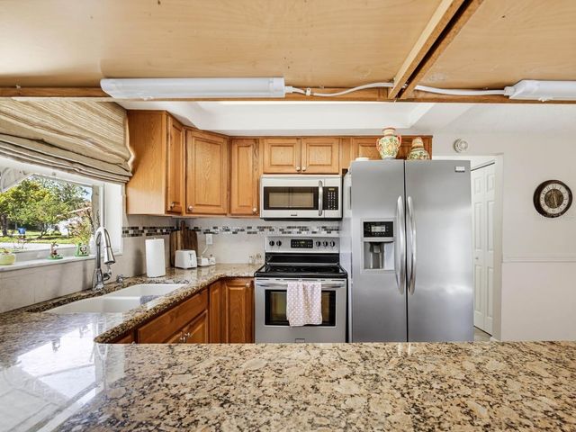 7130 HOLLYBAY ROAD, New Port Richey, FL 34653