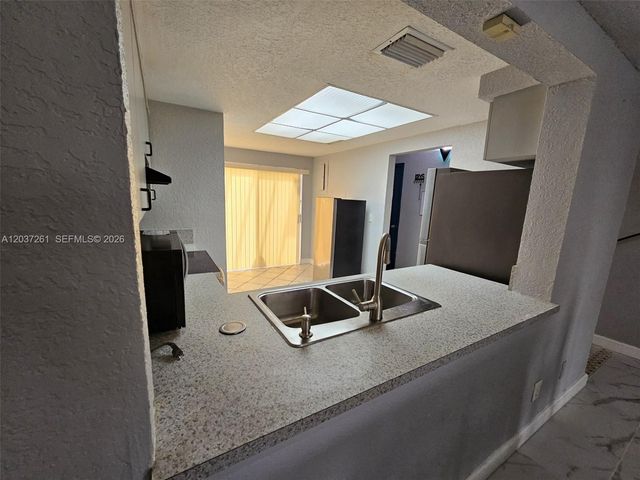 8837 NW 48th St ., Sunrise, FL 33351