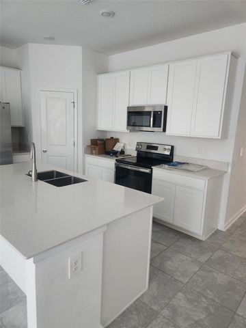 202 BRAVE ROAD, Davenport, FL 33837