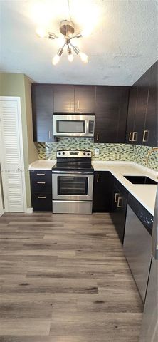 1201 NE 191st St G306, Miami, FL 33179