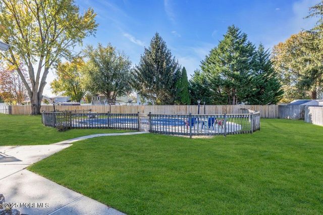 9 Cherry Hill Lane, Manalapan, NJ 07726