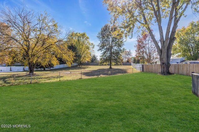 9 Cherry Hill Lane, Manalapan, NJ 07726