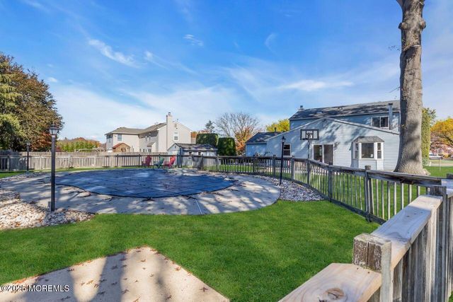 9 Cherry Hill Lane, Manalapan, NJ 07726