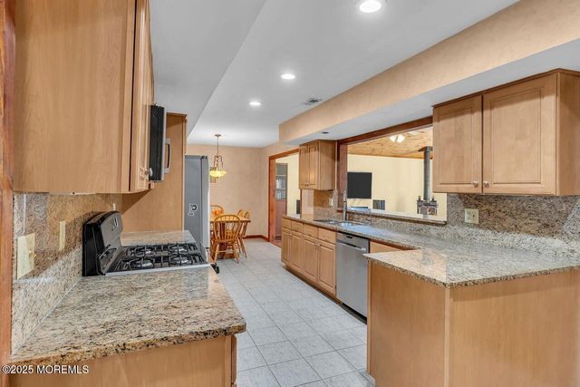 9 Cherry Hill Lane, Manalapan, NJ 07726