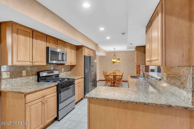 9 Cherry Hill Lane, Manalapan, NJ 07726