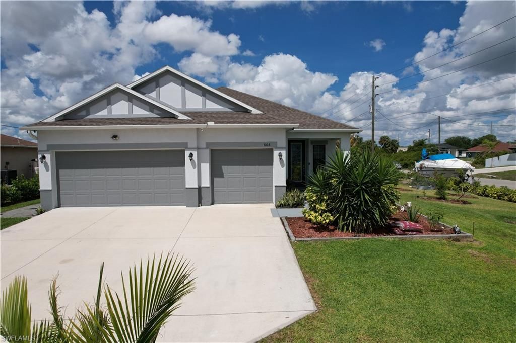 605 Norman AVE, LEHIGH ACRES, FL 33971 — exterior