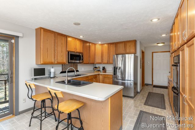 15342 W Almy, Howard City, MI 49329