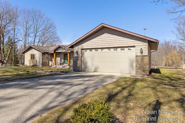 15342 W Almy, Howard City, MI 49329