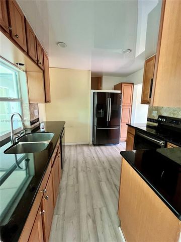 2031 NW 32nd Street, Oakland Park, FL 33309