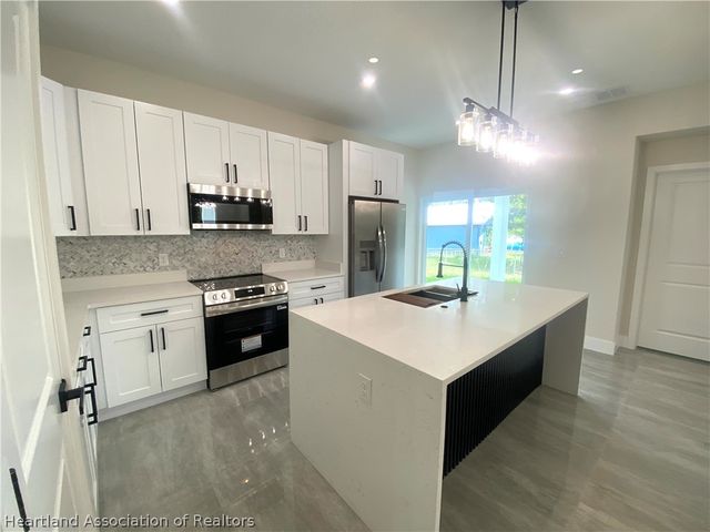 703 Aston-Martin Drive, Sebring, FL 33872