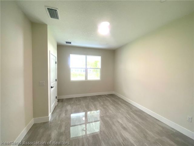 703 Aston-Martin Drive, Sebring, FL 33872