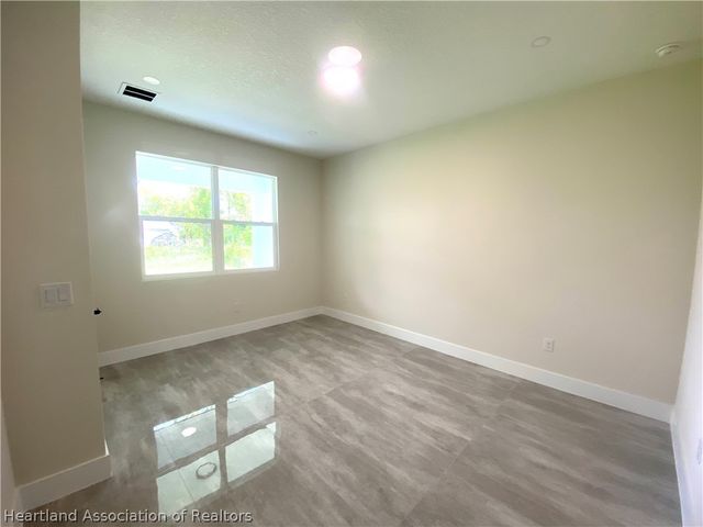 703 Aston-Martin Drive, Sebring, FL 33872