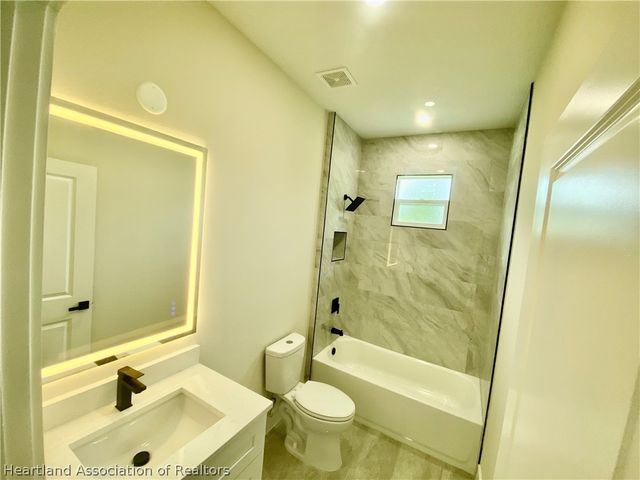 703 Aston-Martin Drive, Sebring, FL 33872