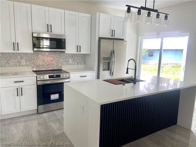 703 Aston-Martin Drive, Sebring, FL 33872