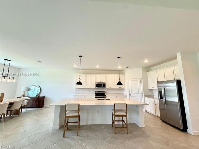 9291 Aqua Overlook CT, Lehigh Acres, FL 33936