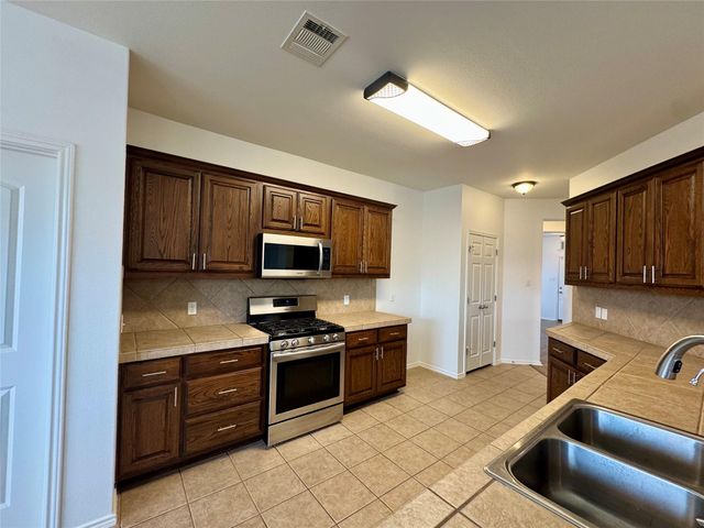 193 Blossom Valley STRM, Buda, TX 78610