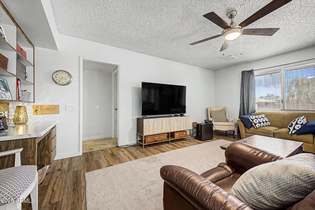 13015 W WHISPERING OAKS Drive, Sun City West, AZ 85375