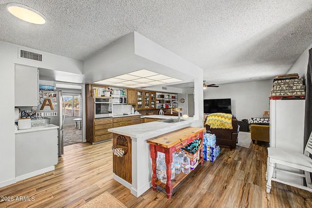 13015 W WHISPERING OAKS Drive, Sun City West, AZ 85375
