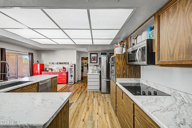 13015 W WHISPERING OAKS Drive, Sun City West, AZ 85375
