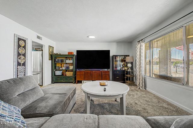 13015 W WHISPERING OAKS Drive, Sun City West, AZ 85375