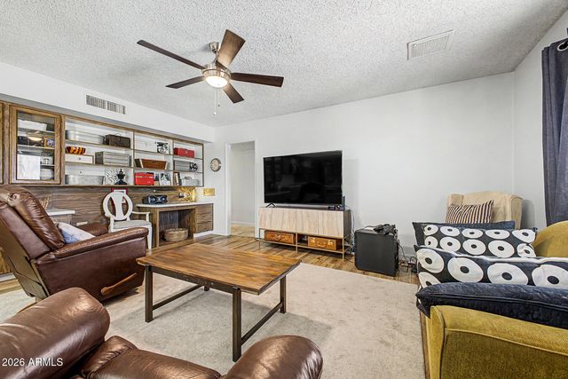 13015 W WHISPERING OAKS Drive, Sun City West, AZ 85375