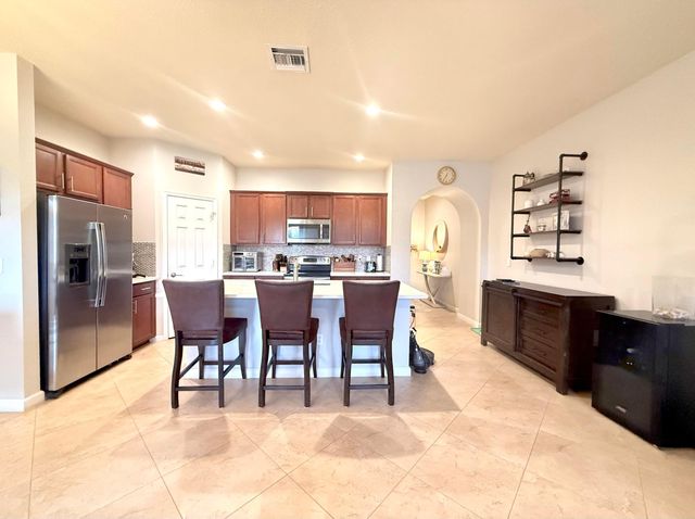 10361 WELLINGTON PARC Drive, Wellington, FL 33449