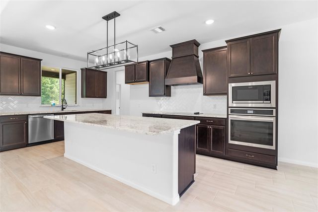 21203 Peach Wood Ct, Cleveland, TX 77328