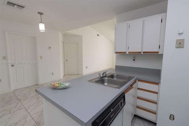 18304 NW 68th Ave L, Hialeah, FL 33015