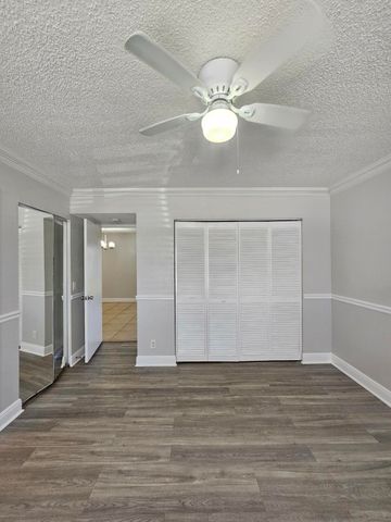 1453 LAKE CRYSTAL Drive D, West Palm Beach, FL 33411