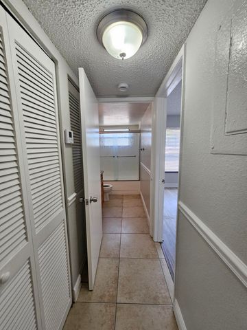 1453 LAKE CRYSTAL Drive D, West Palm Beach, FL 33411