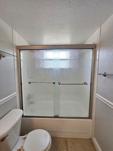 1453 LAKE CRYSTAL Drive D, West Palm Beach, FL 33411