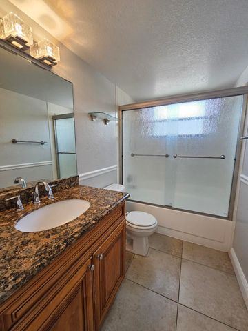 1453 LAKE CRYSTAL Drive D, West Palm Beach, FL 33411