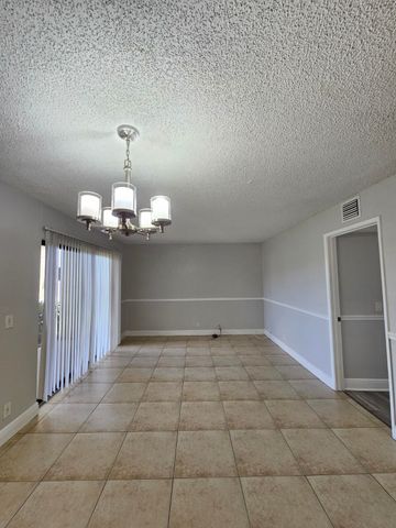 1453 LAKE CRYSTAL Drive D, West Palm Beach, FL 33411