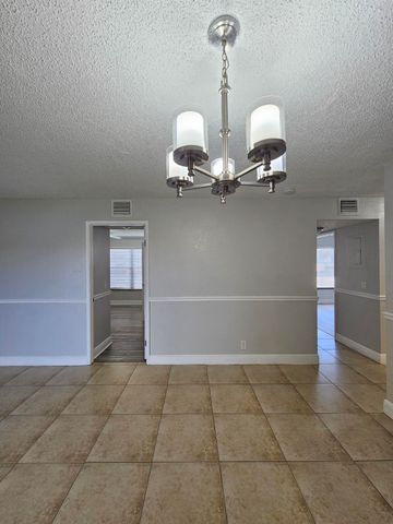 1453 LAKE CRYSTAL Drive D, West Palm Beach, FL 33411