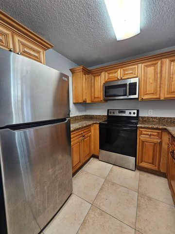 1453 LAKE CRYSTAL Drive D, West Palm Beach, FL 33411