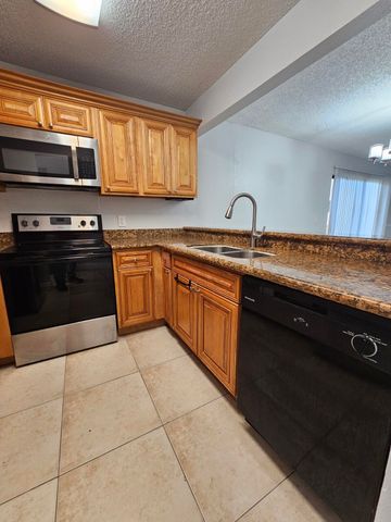 1453 LAKE CRYSTAL Drive D, West Palm Beach, FL 33411