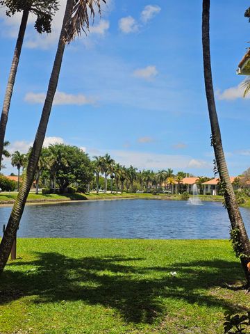 1453 LAKE CRYSTAL Drive D, West Palm Beach, FL 33411