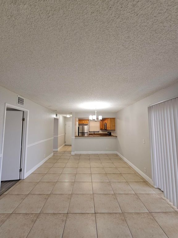 1453 LAKE CRYSTAL Drive D, West Palm Beach, FL 33411