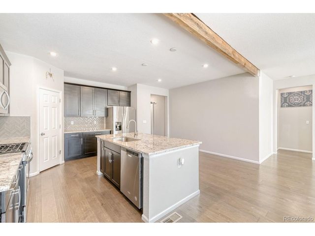 864 Penstemon Dr, Henderson, CO 80640