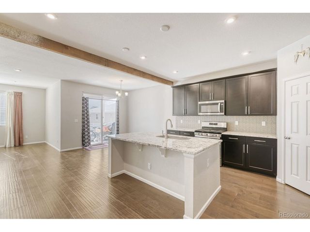 864 Penstemon Dr, Henderson, CO 80640