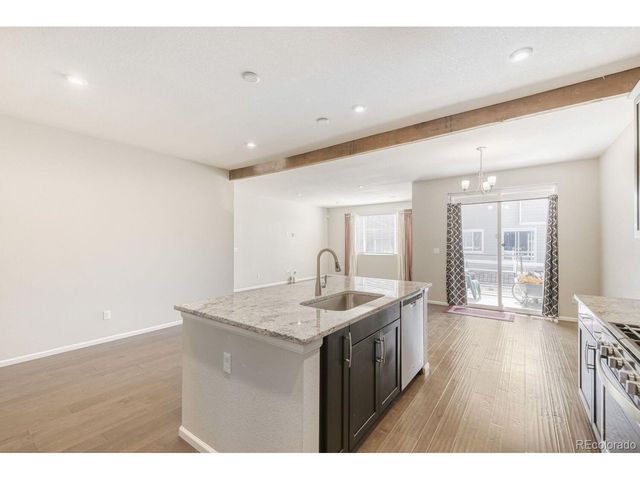 864 Penstemon Dr, Henderson, CO 80640