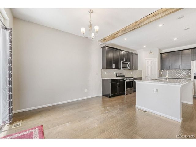 864 Penstemon Dr, Henderson, CO 80640