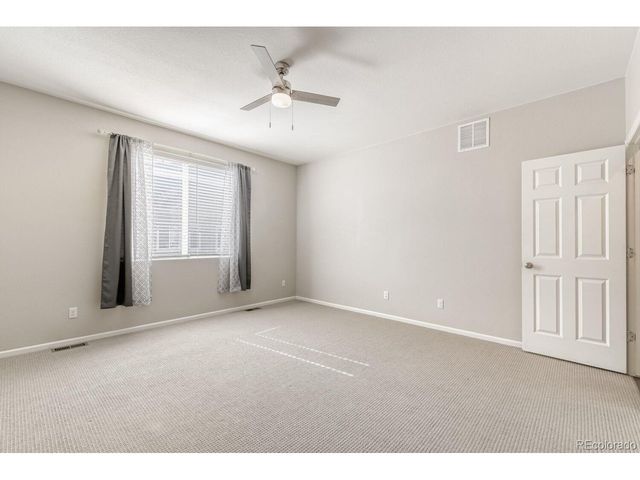 864 Penstemon Dr, Henderson, CO 80640