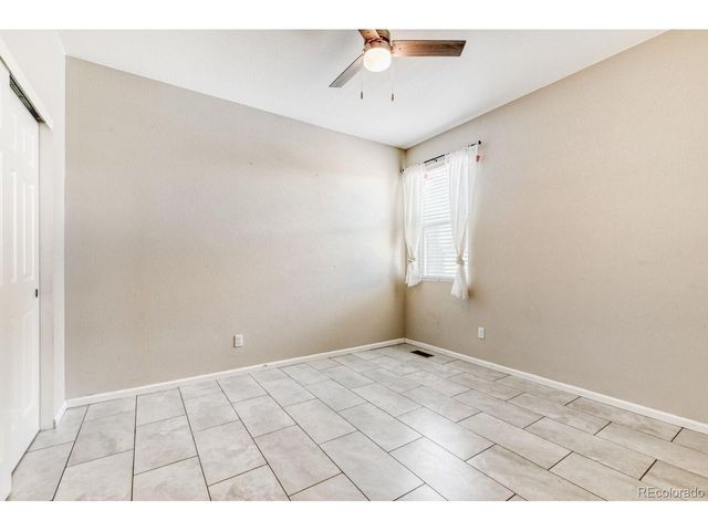 864 Penstemon Dr, Henderson, CO 80640