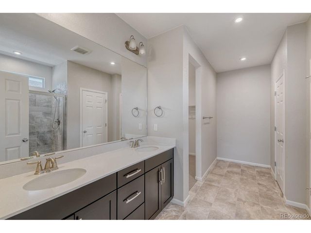 864 Penstemon Dr, Henderson, CO 80640