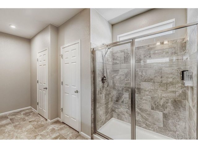 864 Penstemon Dr, Henderson, CO 80640