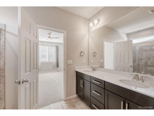 864 Penstemon Dr, Henderson, CO 80640