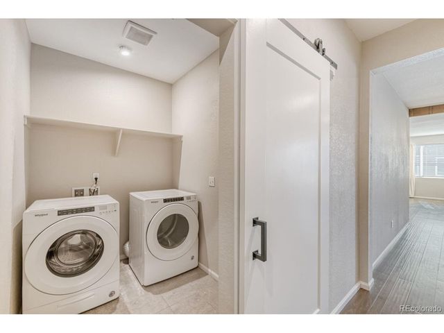 864 Penstemon Dr, Henderson, CO 80640