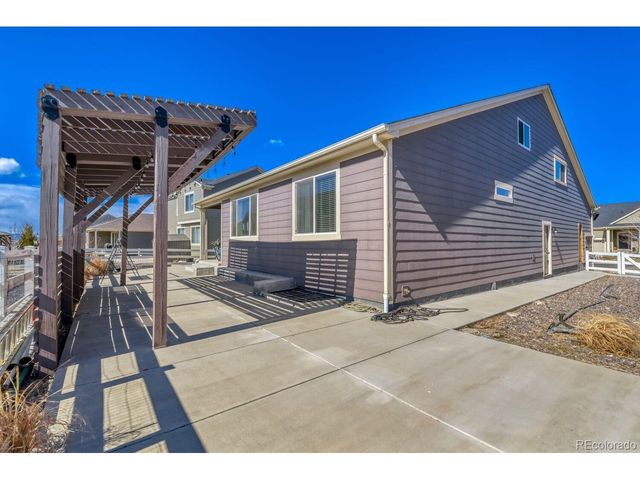 864 Penstemon Dr, Henderson, CO 80640