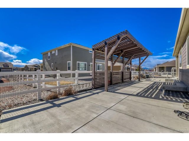 864 Penstemon Dr, Henderson, CO 80640